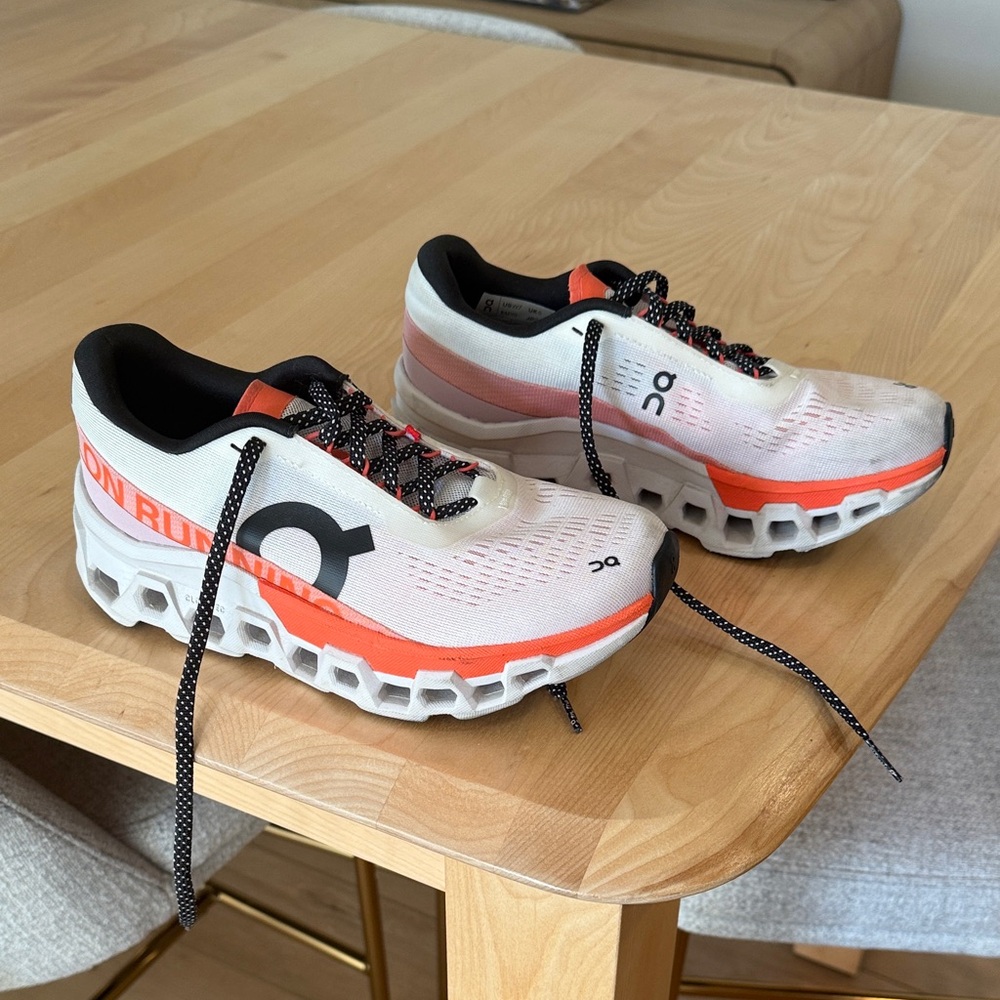 On Cloud Running White and Orange cloud monster running shoes